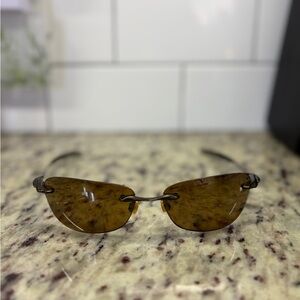 Oakley Rimless Sunglasses with Brown Tortoise Lenses